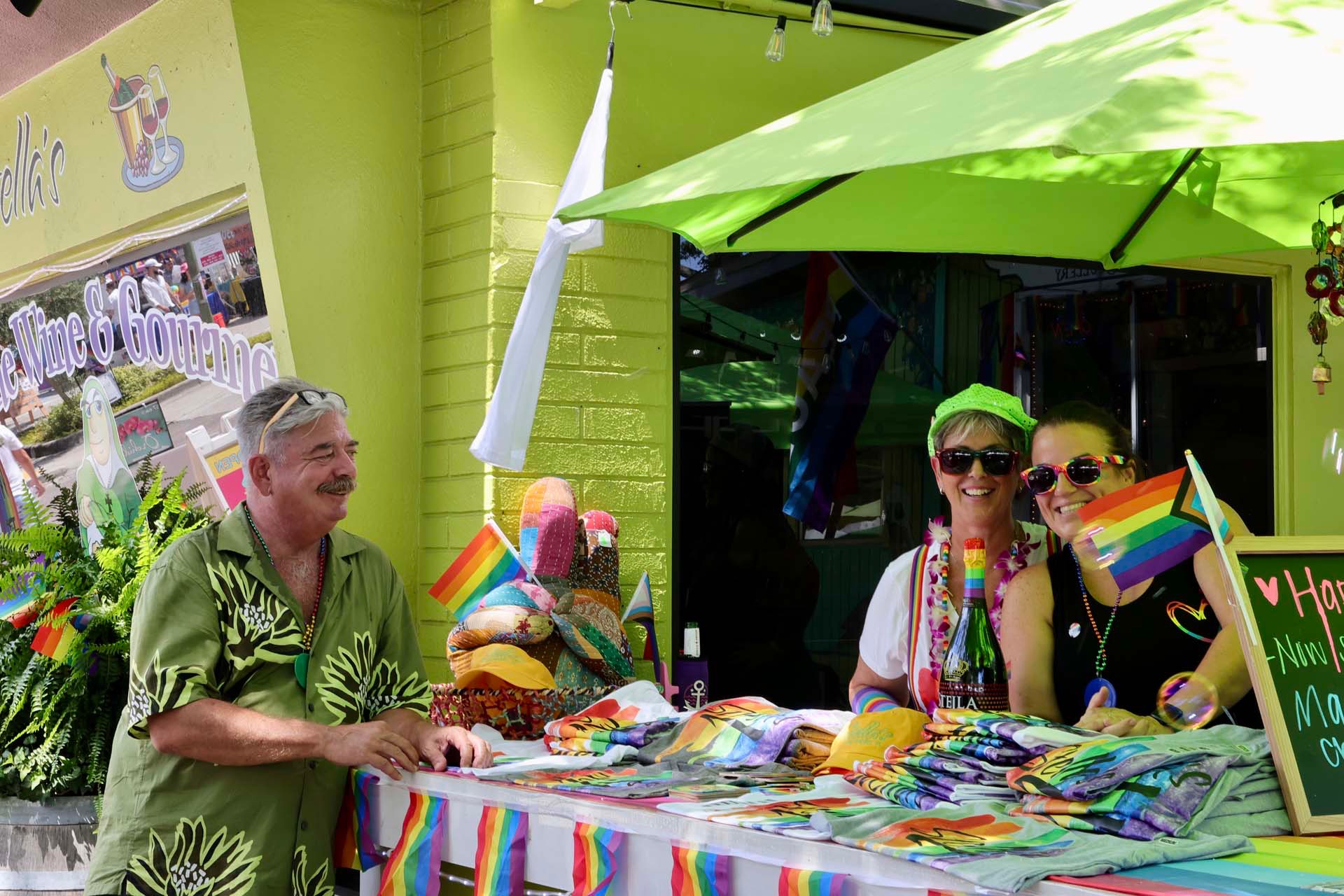 Vendor booth with pride flags at Gulfport Pride