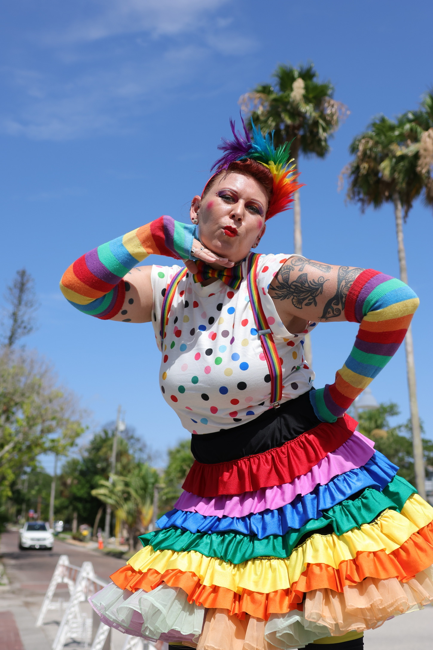 Gulfport Pride community member in colorful rainbow outfit at a Gulfport pride event