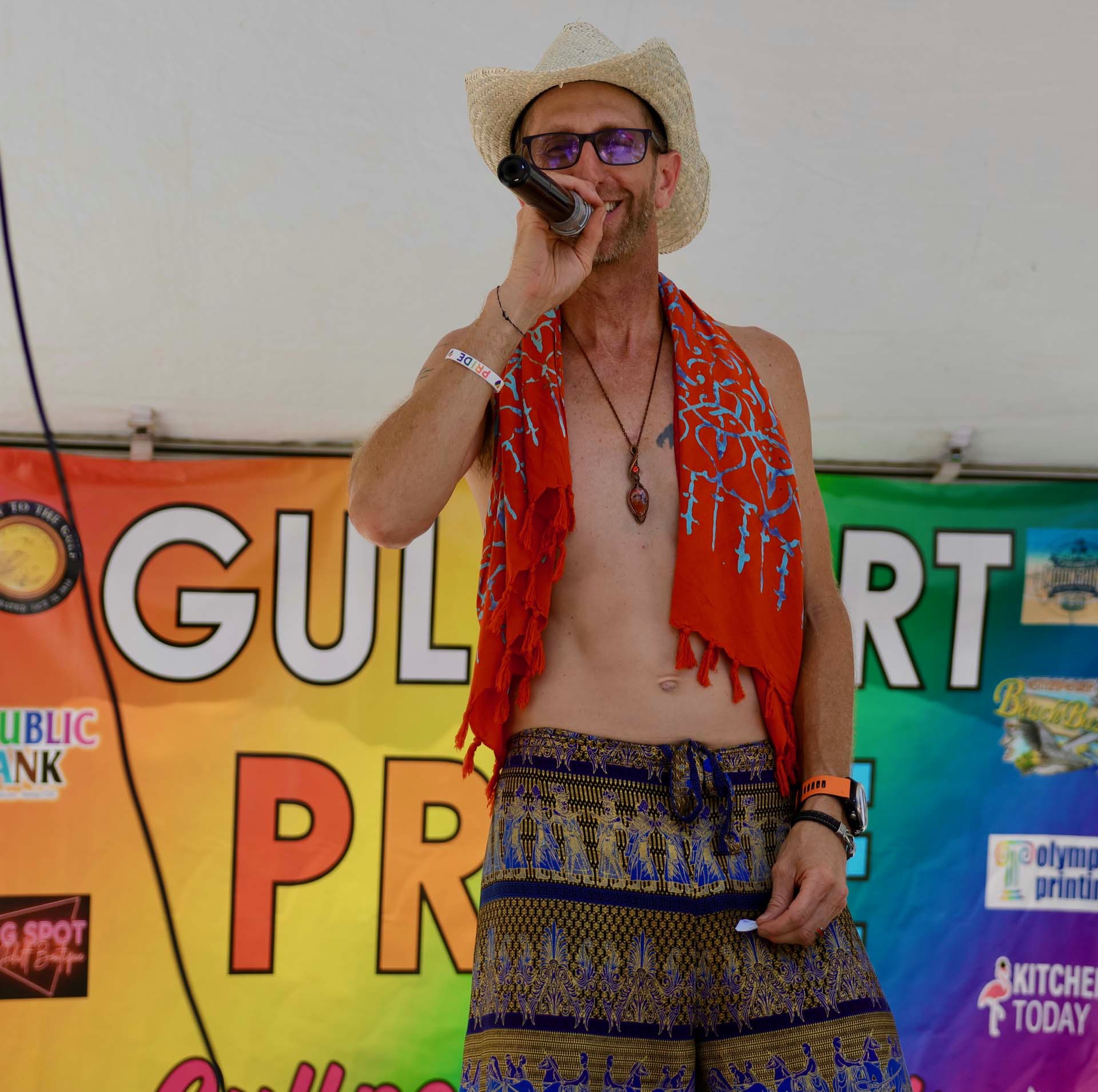 Performer on stage at Gulfport Pride